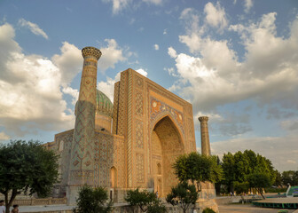 Wall Mural - Sher Dor Madrassah on the Registan Square in Samarkand at sunset, Uzbekistan