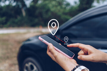 Woman use smartphone to look up map plan route for travel.