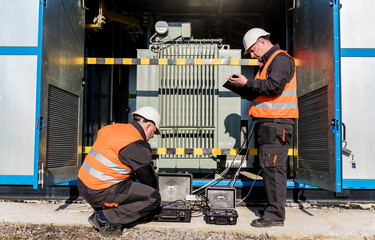 Wall Mural - execution of electrical measuring works on the power transformer