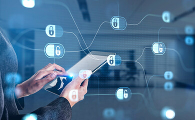 Poster - Businesswoman in formal suit is browsing the Internet in tablet device. Blue glowing information protection padlock icons. Concept of cyber security and data storage