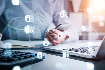 Poster - Woman hand using smartphone with touch screen, blue glowing information protection padlock icons. Concept of cyber security and data storage. Desk with laptop