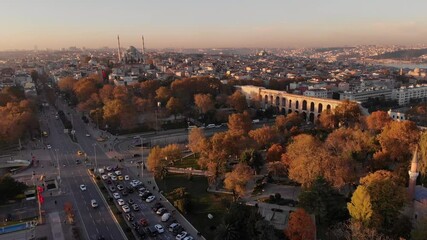 Wall Mural - Aerial view of autumn Istanbul, Turkey. On the horizon is the aqueduct of Valens and the Fatih Mosque. 