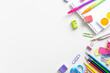 © photoguns - Frame of school stationery on white background. Flat lay, top view, space for text. Back to school concept.