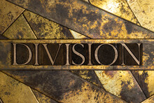 Division Text On Vintage Textured Silver Grunge Copper And Gold Background