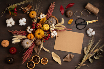 Wall Mural - Diy rustic autumn table decoration.  Floral interior decor for fall holidays with handmade pumpkins. Flatlay, top view.