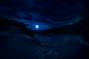 Wall Mural - mountain road through the snowy forest on a full moon night. scenic night winter landscape of dark b
