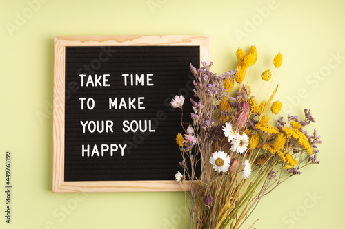 Felt letter board with text take time to make your soul happy. Mental health, positive thinking, emotional wellness concept