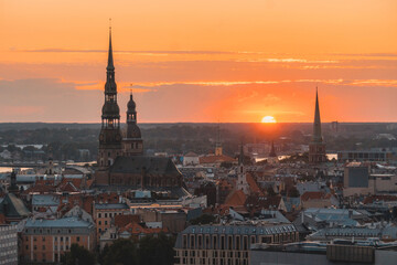 Wall Mural - Sunset panoramic aerial view over Riga city, the capital of Latvia, European baltic country