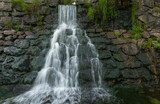Fototapeta Łazienka - Details of a beautiful waterfall in countryside