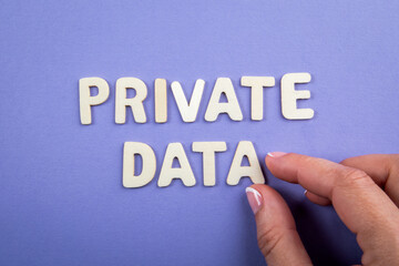 Wall Mural - Private Data. White wooden letters with text on a purple background