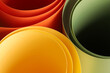 Leinwandbild Motiv abstract vibrant color curve background, creative graphic wallpaper with orange, yellow and green for presentation, concept of dynamic movement and space, detail of bending plastic sheets