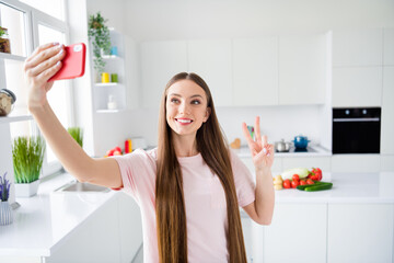 Canvas Print - Photo portrait young woman taking selfie showing v-sign gesture smiling