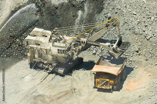 Electric rope shovel loading a dump truck at a copper mine in Chile