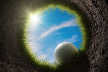 Golf Ball Is Falling Into Hole. View From Inside Of Hole. 3D Rendered Illustration.
