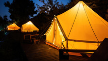 Glamping At Night, Few Glowing Tents
