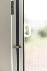 Mosquito net frame on PVC window