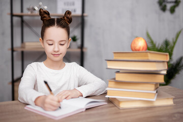 Wall Mural - school, homework and education concept - school girl doing homework at home