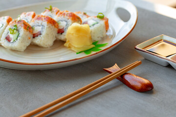 Wall Mural - Japanese sushi roll with salmon on plate