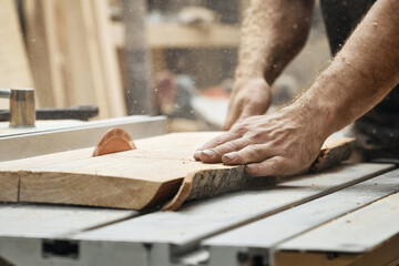 Closeup of a carpenter's hand.