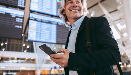 Wall Mural - Business traveler at international airport