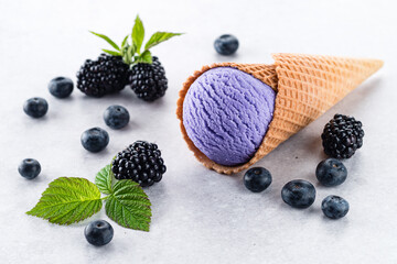 Canvas Print - Blackberry purple ice cream in waffle cone