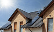 Solar panels or photovoltaic plant on the roof of a modern house.