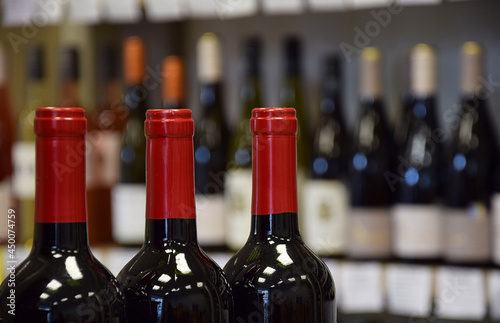 Wine bottles in wine store and ready for home delivery