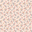 Spring flowers print. Vector seamless floral pattern. Plant design for fashion prints. Endless print made of small coral and blue flowers. Elegant template. Light pink background. Stock vector.