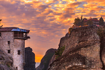 Wall Mural - Sunset over Varlaam monastery in Meteora, Greece