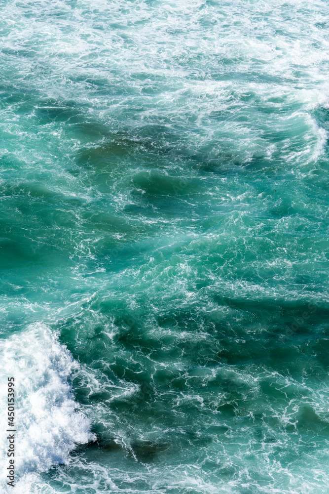Aerial view of the ocean waves and beach. Blue water background. Sea ...