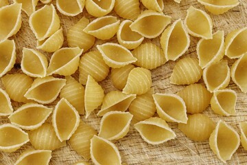 Sticker - Italian raw pasta conchiglie rigate macaroni shells Traditional food.