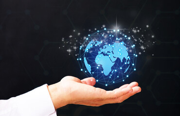 Poster - hand holding a globe with map