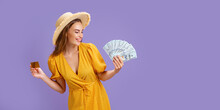 Caucasian Woman 20s Wearing Straw Hat Holding Credit Card And Fan Of Dollar Cash Isolated Over Purple Background