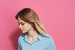 © SHOTPRIME STUDIO - pretty blonde in blue shirt cosmetics pink background