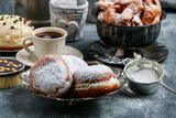 Fototapeta  - Fat Thursday celebration - traditional donuts filled with marmalade.