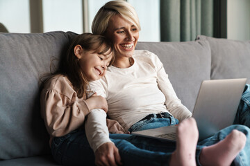 Canvas Print - Happy young mother and her little daughter