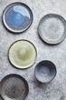 Food background. Empty plates on grey background. Top view, flatlay, copyspace