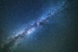Fototapeta Zachód słońca - Beautiful bright milky way galaxy on the dark sttary sky. Space, astronomical background. 