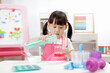 © M-image - young  girl making sweet gems for homeschooling
