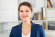© JackF - Portrait of young elegant confident smiling businesswoman in modern office ..