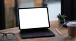 © wichayada - Mockup copy space blank screen laptop and office supplies on white desk. Stylish workspace concept.