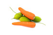 Two ripe carrots with few spiny gourds on an isolated white background