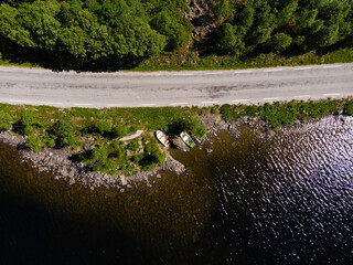 Sticker - Road along fjord shore, Norway. Top down view.