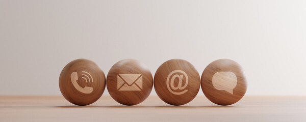 contact us icons print screen on wooden sphere such as call mail address and message for customer service and self support for work from home WFH due to corona virus or COVID19 pandemic by 3d render.