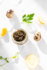 Wall Mural - Appetizers of natural sturgeon black caviar, lemon and parsley