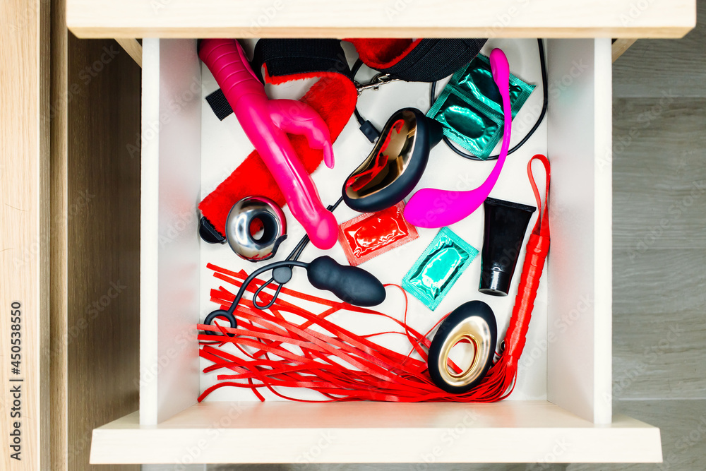 Bedside wooden table or nightstand drawer full of sex toys Stock Photo | Adobe Stock Bedside wooden table or nightstand drawer full of sex toys Stock Photo | Adobe Stock