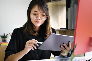 Work from home Company employees use their notebook and computers to work from home to prevent the corona virus from meeting outsiders.