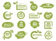 © Tartila - Green eco, organic and vegan product grunge label. Fresh healthy food logo. Bio natural, gmo free, vegetarian package logo stamp vector set
