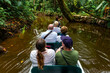 Canoe transport tourist excursion along the rivers of the Amazon rainforest river basin, Yasuni national park, Ecuador.