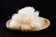 Raw bean vermicelli or dry glass noodles on black background